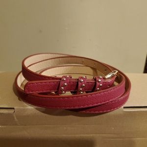 Red studded belt